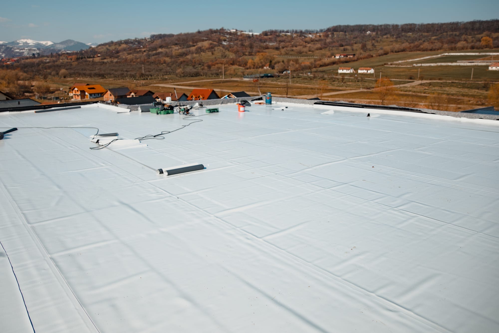 spring roof problems, commercial roof damage, spring weather damage